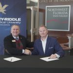 Embry-Riddle Aeronautical University Associate Director – U.S. Campus Operations Mr. Ron Garriga (left) and NWFSC President Dr. Devin Stephenson  (right) recently signed a partnership agreement streamlining the transfer process for students.