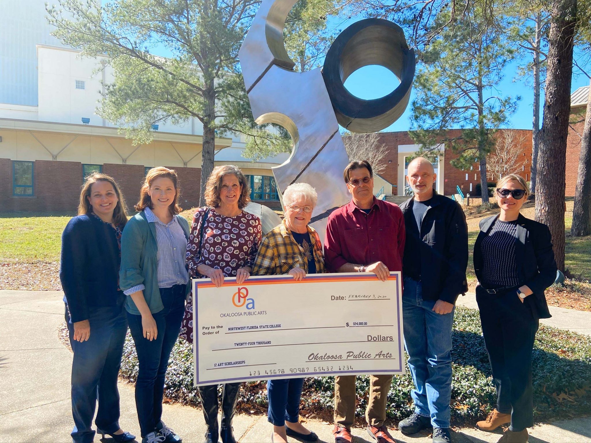 (L to R): Cristie Kedroski, NWFSC Vice President of College Advancement; Leigh Peacock Westman, NWFSC Art Professor; Charlotte Arnold, OPA Board Member; Bernadette Simms, OPA Board Member; Rick Otopalik, OPA Board Member; Clint Mahle, NWFSC Theater Professor/Scenic Design Coordinator; Wren Supak; NWFSC Gallery Director.