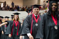 Student Walking in Commencement Ceremony Procession